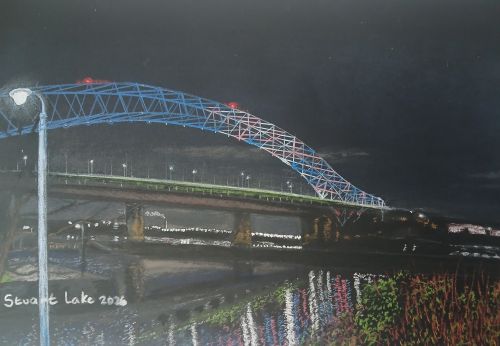 Runcorn Widnes bridge lit up after dark