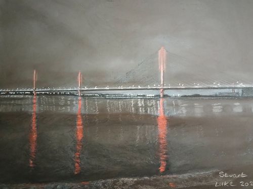 Mersey Gateway bridge lit up after dark